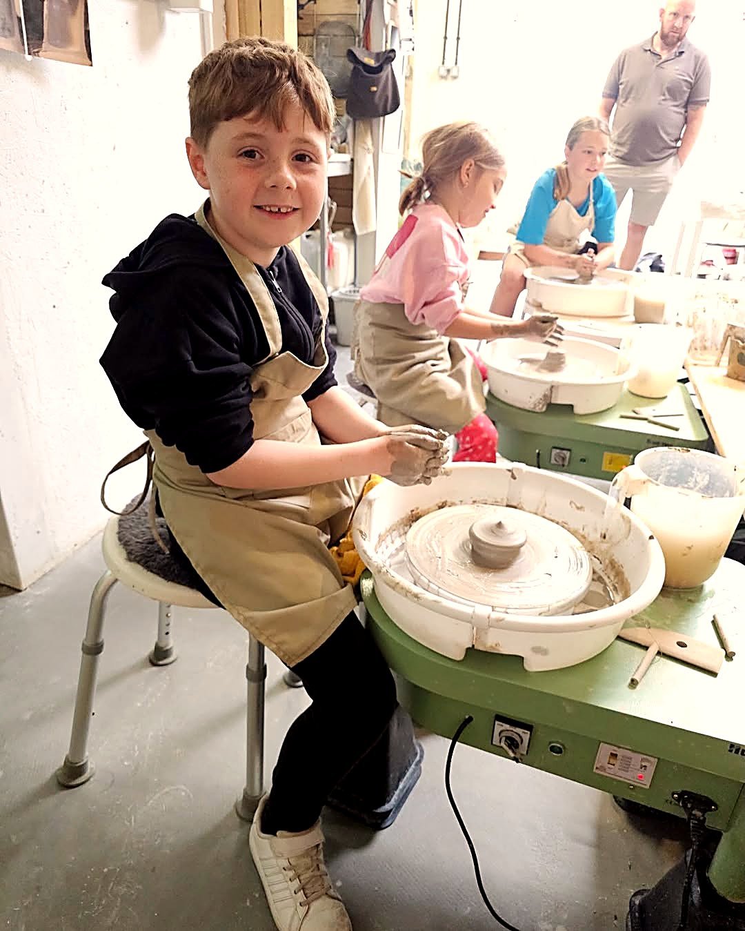Children enjoying a pottery party at the studio
